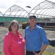 Jill and Ken Lawrence outside their new calf rearing facility