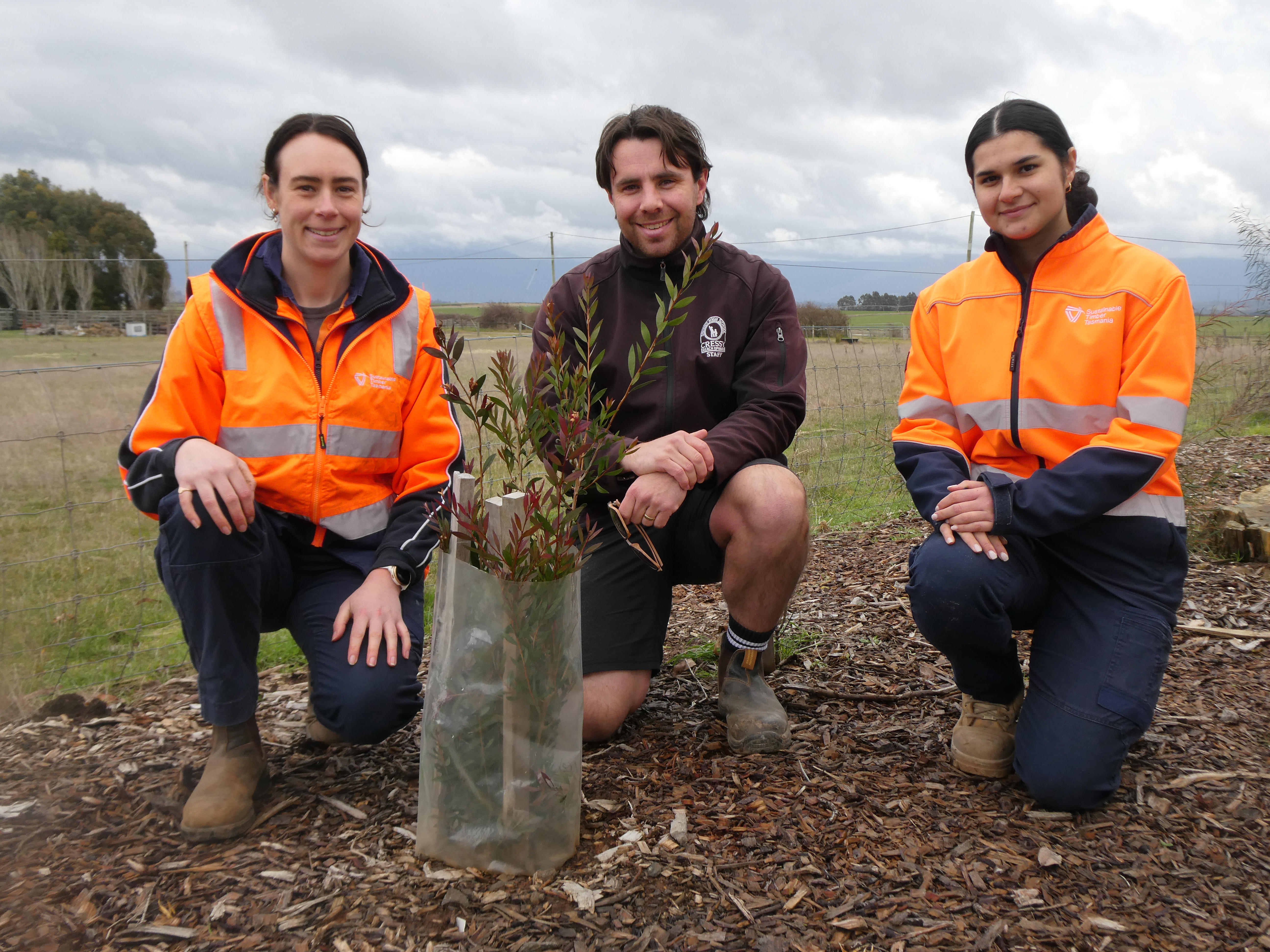 Cressy District High School teacher Lochlan Skinner, with Sustainable Timber Tasmania foresters, Ellen Freeman and Melody Reihana 