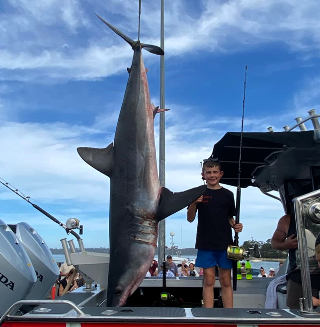 Spencer Cashion with his pending record 141.6 kg Mako Shark that he caught last weekend off St Helens.