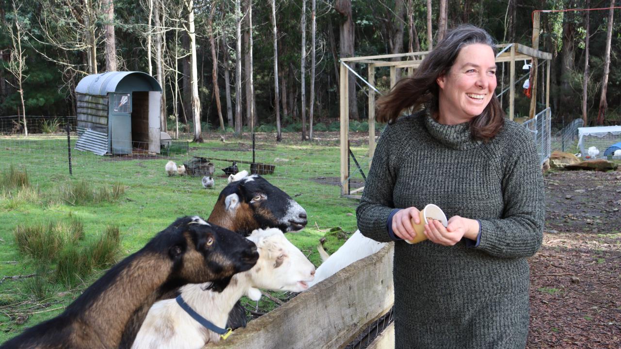 Sonia Thomasson feeding her goats