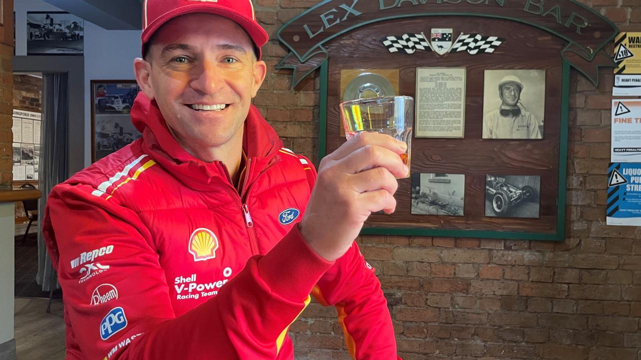 Supercars driver Will Davison toasts his grandfather Lex with a brandy at Country Club Hotel, Longford.