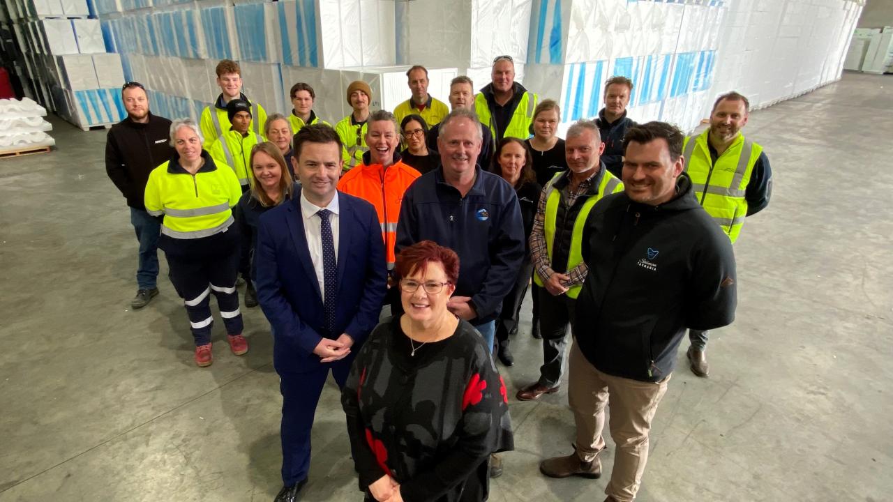 Labor senator Anne Urquhart, Salmon Tasmania CEO Luke Martin, opposition leader Dean Winter and West Coast Mayor Shane Pitt with salmon industry supporters at Polyfoam, Westbury.