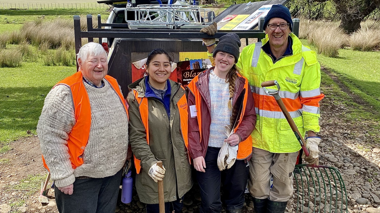 L-R Blaze Aid volunteers; Cheryl Youkee from Sheffield, Vanessa Alayo from Canada, Amy Curran from Ireland and Stewart Crafter from Melbourne on a property at Hamilton damaged by floods.