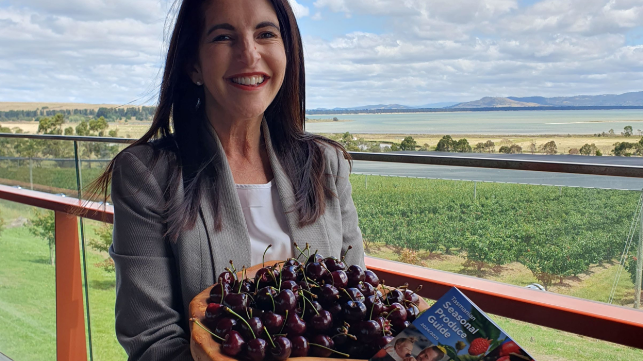 Primary Industries Minister Jane Howlett with a box of cherries at the SPG launch