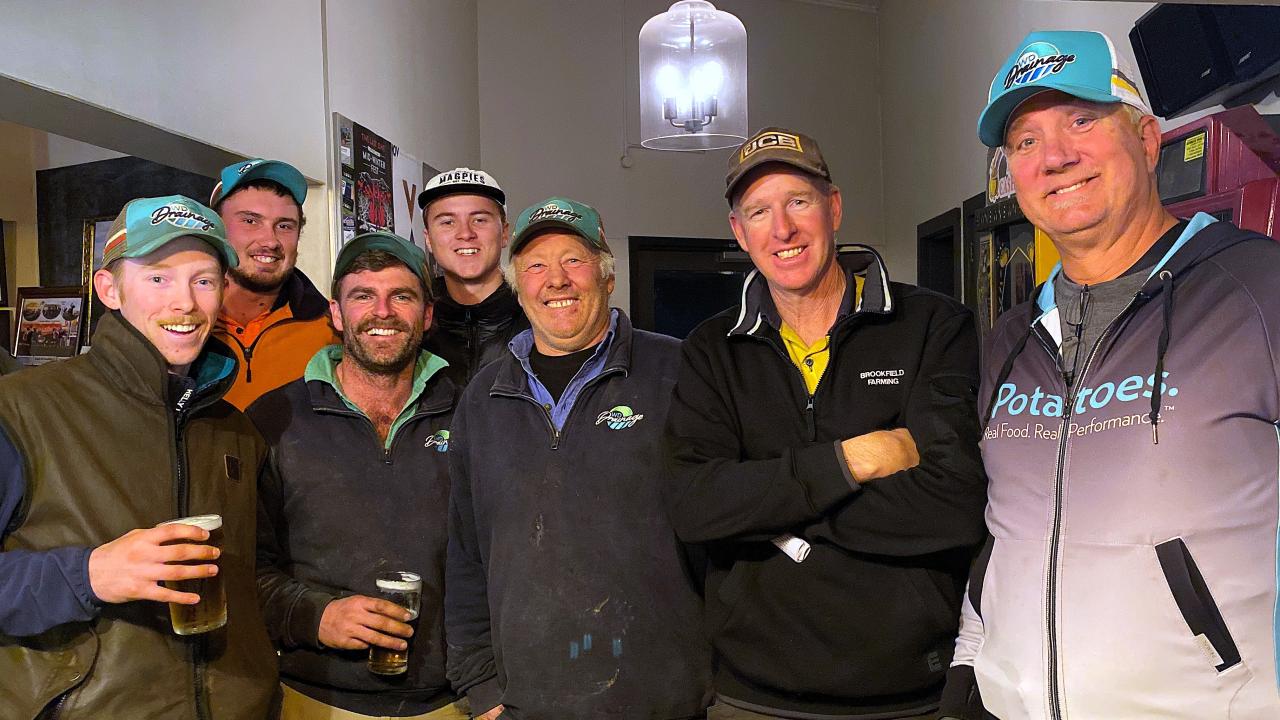 American potato expert Dick Okray, right, with Tasmanian farmers  Hayden Richardson, left,  Lauchie Gleeson, Will Wishaw, Flynn Tueon and Paul Woodward at Carrick on Friday.