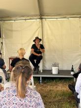 Agricultural scientist Christina Giudici leading a talk on Biochars myths and magic after running a biochar-making workshop one day one.