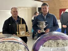 Campbell Town show saw Grand champion fleece and most valuable fleece awarded to Rockford Farm's Scott Reardon (Left) with Damian Meaburn from Wool Solutions