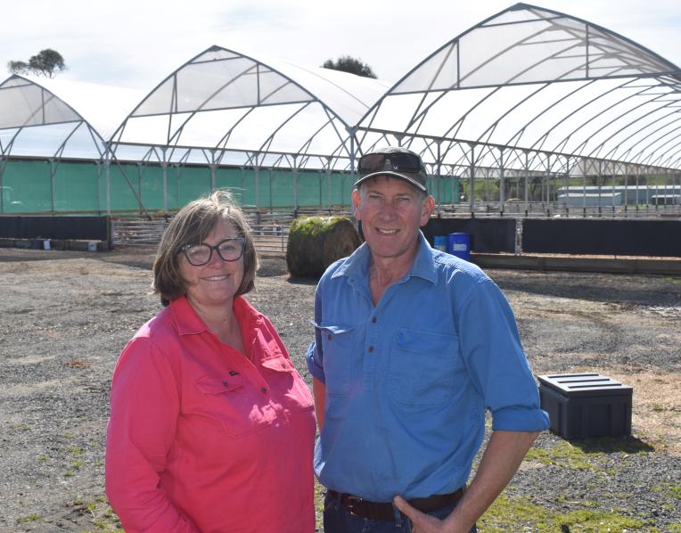 Jill and Ken Lawrence outside their new calf rearing facility