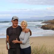 Marco and Vicki Linardi at their property surrounded by open ocean.