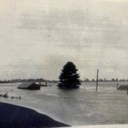 Flooded railway station, Leighlands Rd Evandale as the floodwaters of 1929 rose as much as 17 metres.