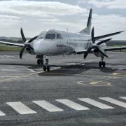 Rex plane landing at King Island