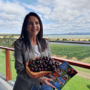 Primary Industries Minister Jane Howlett with a box of cherries at the SPG launch