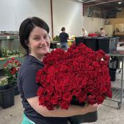 Megan Lee in the packing area at Tamar Valley Roses