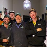 American potato expert Dick Okray, right, with Tasmanian farmers  Hayden Richardson, left,  Lauchie Gleeson, Will Wishaw, Flynn Tueon and Paul Woodward at Carrick on Friday.